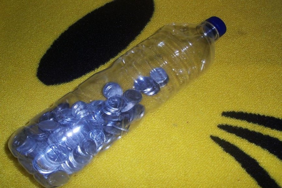 Cara membuat celengan dari botol bekas air mineral